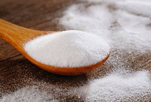 Salt in a wooden spoon