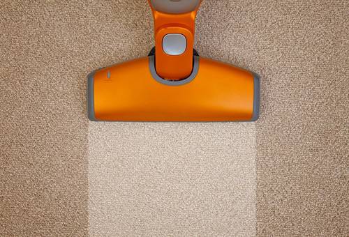 Vacuuming a carpet