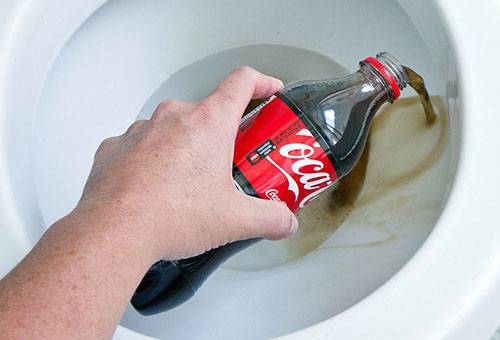 Cleaning the toilet Coca-Cola