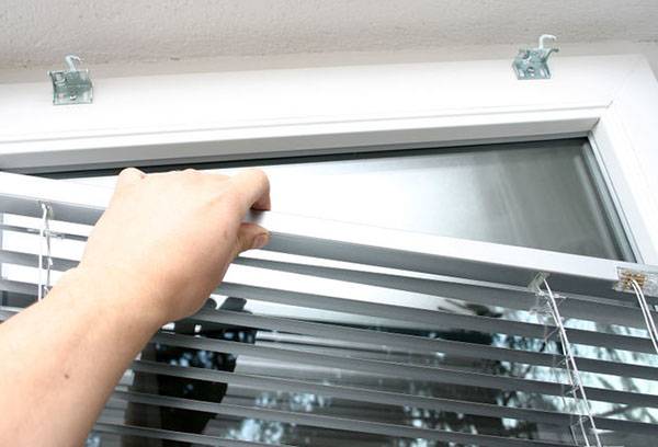 Removing horizontal blinds from a window