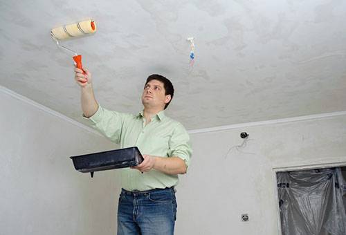 Whitewashed ceiling treatment with water