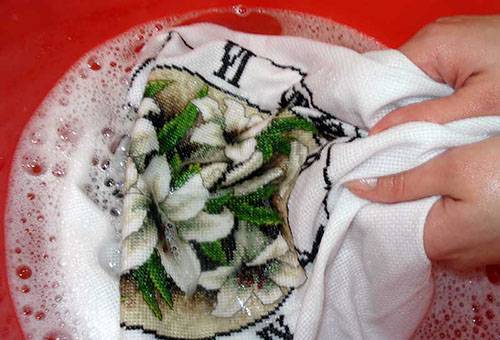 Wash the canvas with cross stitch