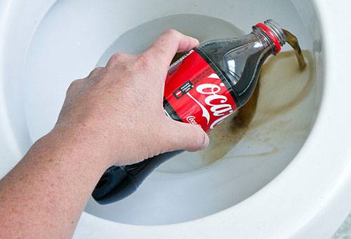 Coca-Cola washing the toilet