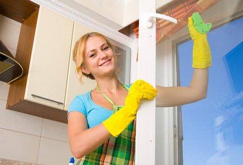 girl washes windows