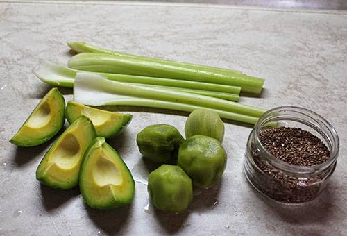 Peeled avocados and kiwi