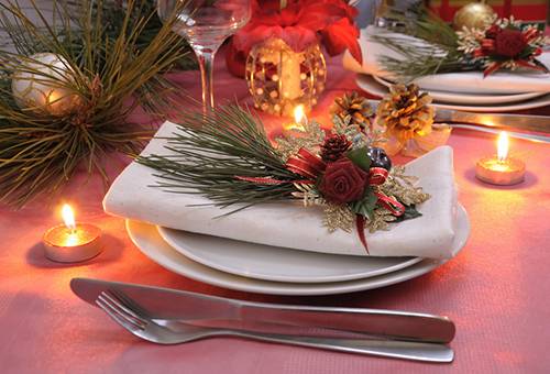 Christmas table setting with white napkins