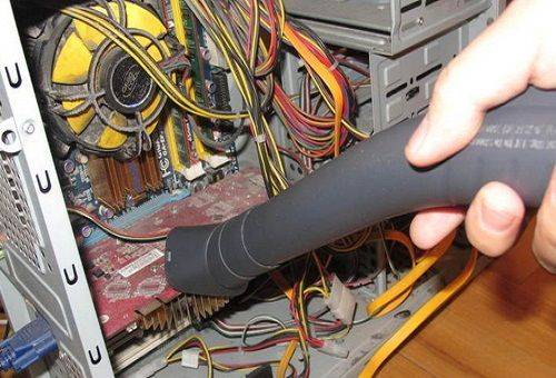vacuuming a computer