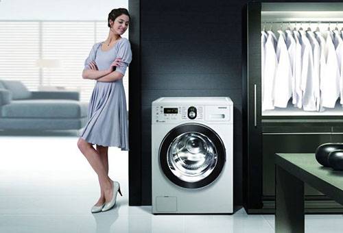 Girl and a new washing machine