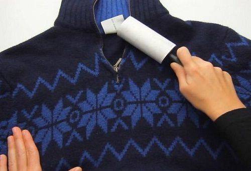 cleaning spools of clothing with double-sided tape