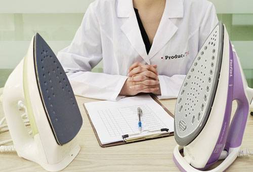 Irons with different types of sole coating