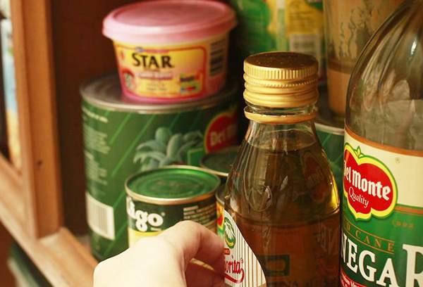 Olive oil in the kitchen cabinet