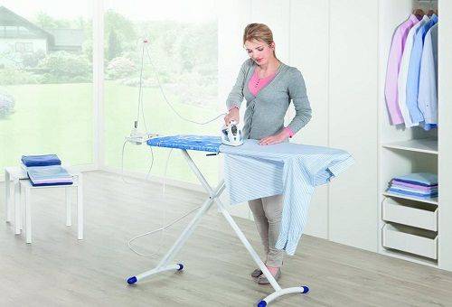 woman ironing a shirt