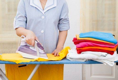 woman ironing clothes