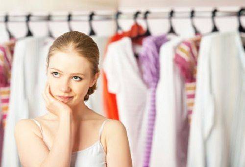 girl at the wardrobe with clothes