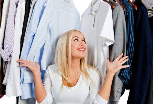 girl at the wardrobe with clothes