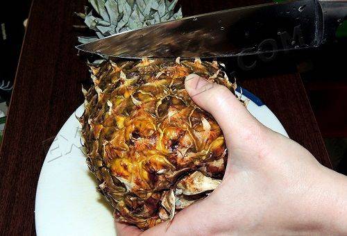 peeling pineapple