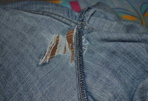 hole in jeans between legs