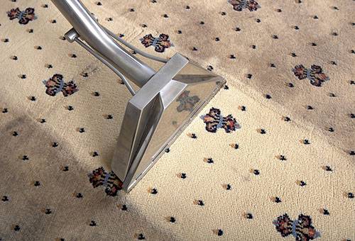 Vacuuming a carpet