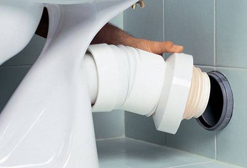 Connect the toilet to the sewer