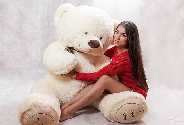 Girl with a big teddy bear
