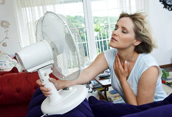 girl in front of a fan