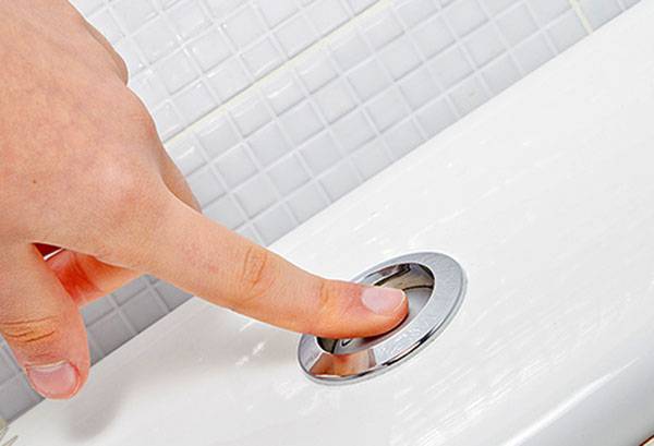 Drain the toilet tank