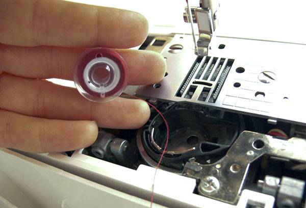 Preparing to clean the sewing machine
