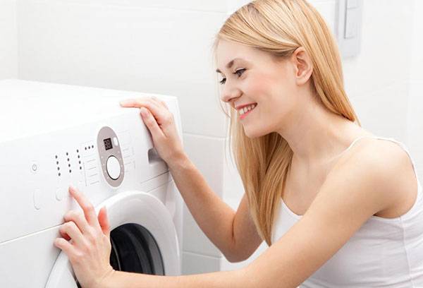 Girl and a washing machine