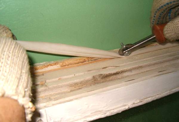 Insulation for a wooden window
