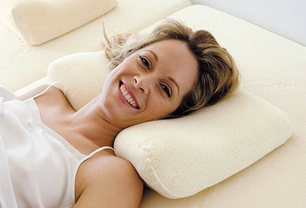 Woman on orthopedic pillow