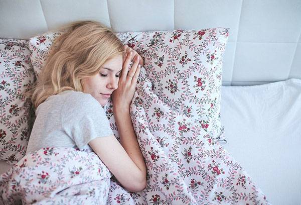Girl sleeping in bed