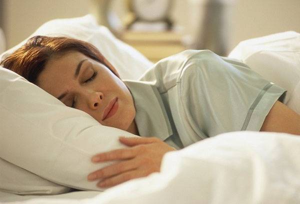 Woman sleeping on a pillow