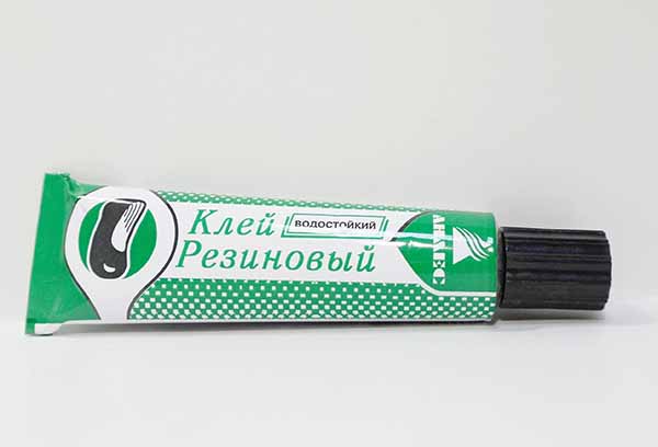 Tube of rubber glue