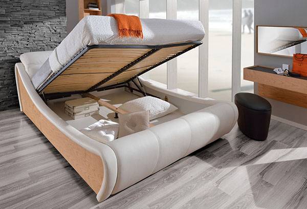 Double bed with storage compartment