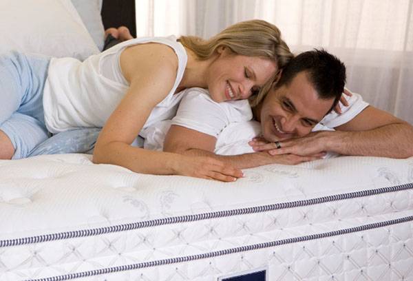 Couple on a new mattress