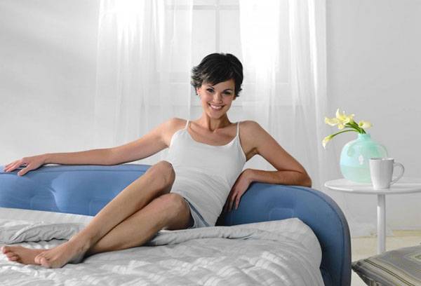 Girl on the bed with an air mattress