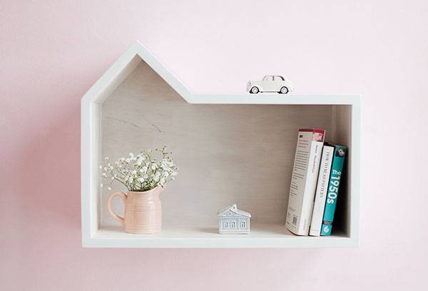 Shelf with books and souvenirs.