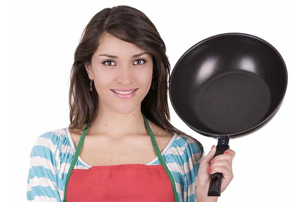 Girl with teflon pan