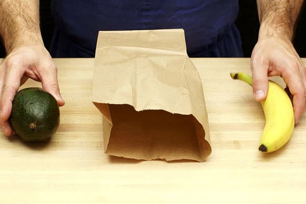 The method of ripening avocados in a package with a banana