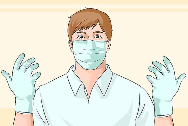 Man in gloves and a protective bandage.