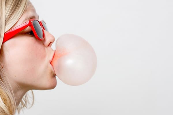 Girl inflates gum