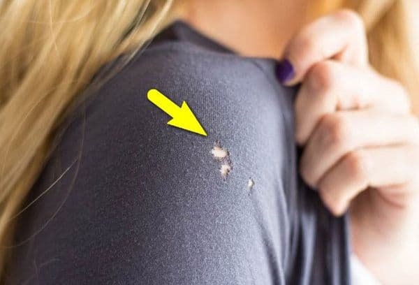 Outerwear with a hole