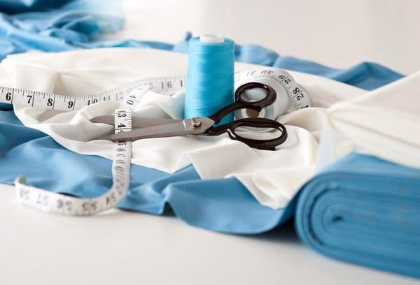 fabric, scissors and threads