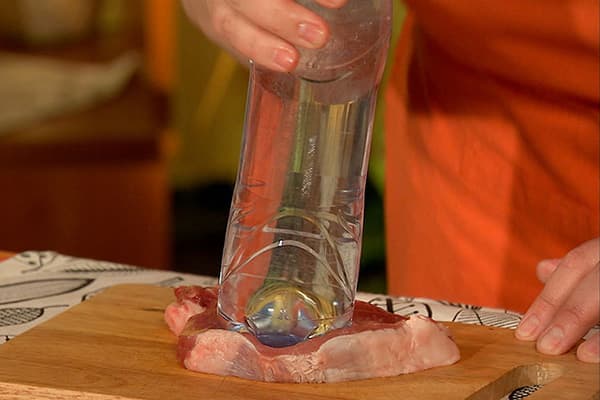 Beating meat with a bottle