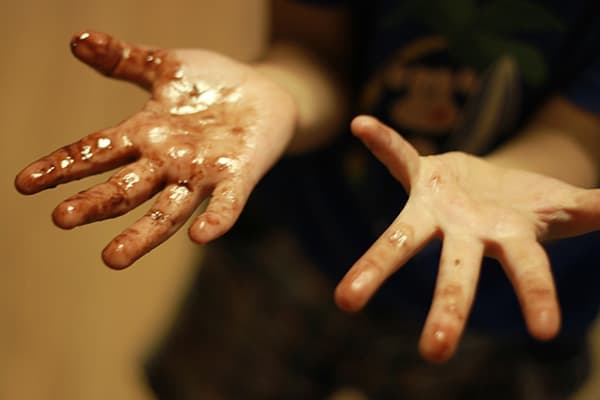 Hands stained with stain