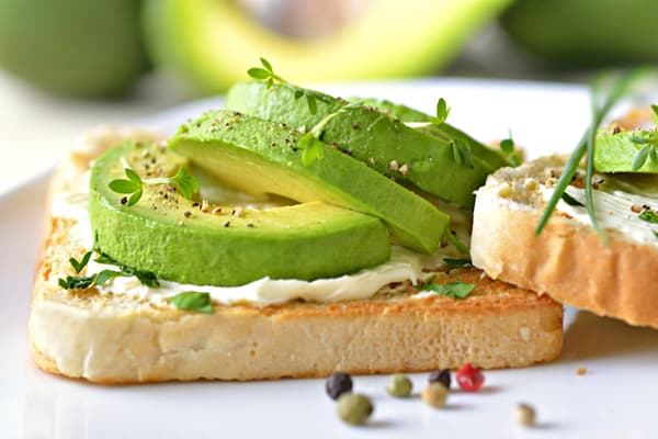 Toast with avocado and soft cheese
