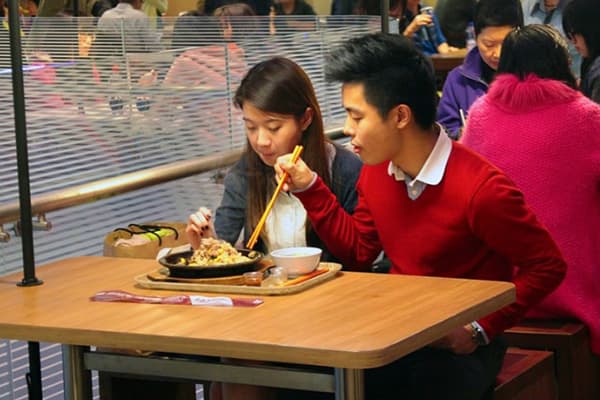 Asians eat from the same plate