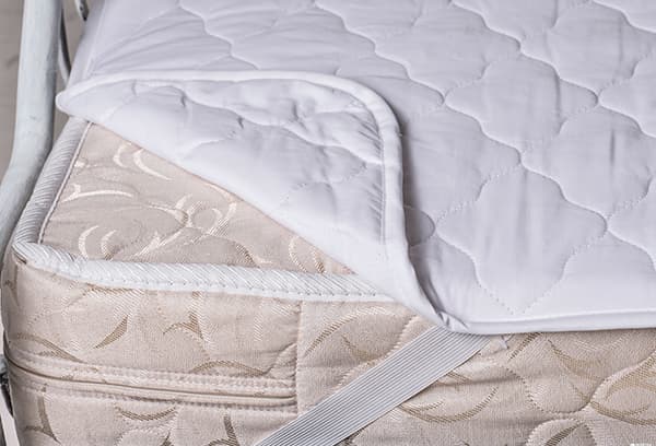 Protective mattress pad