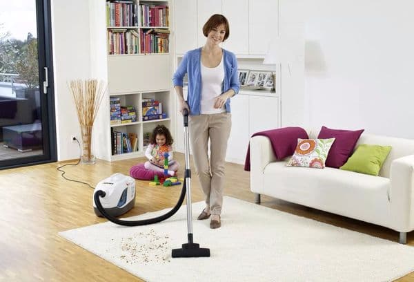 Woman cleaning an apartment