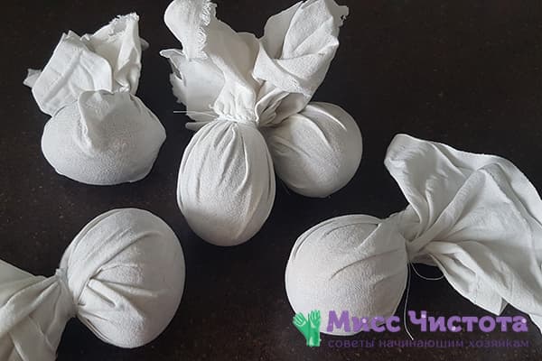 Eggs wrapped in two layers of fabric.